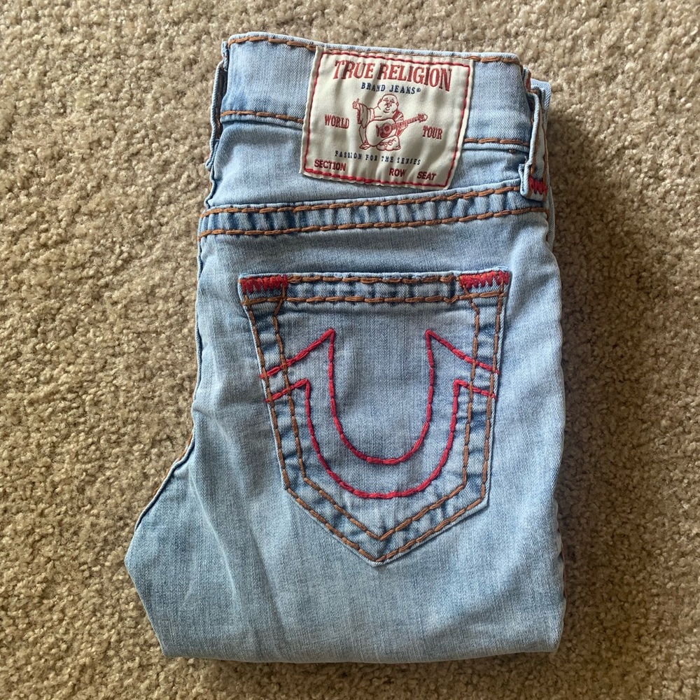 Light wash, skinny True Religion jeans.